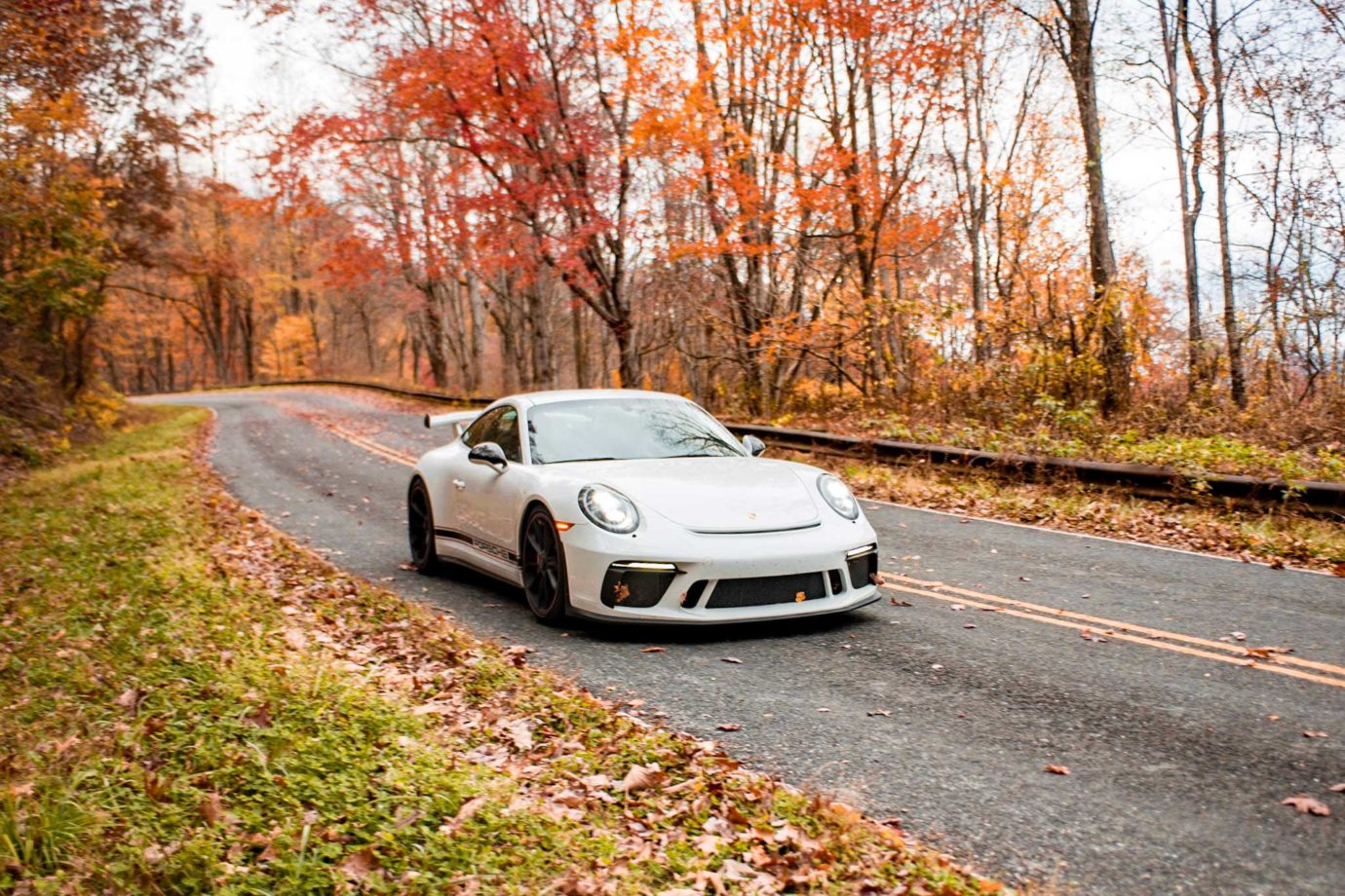 White Porsche GT sports car driving in the Smoky Mountains